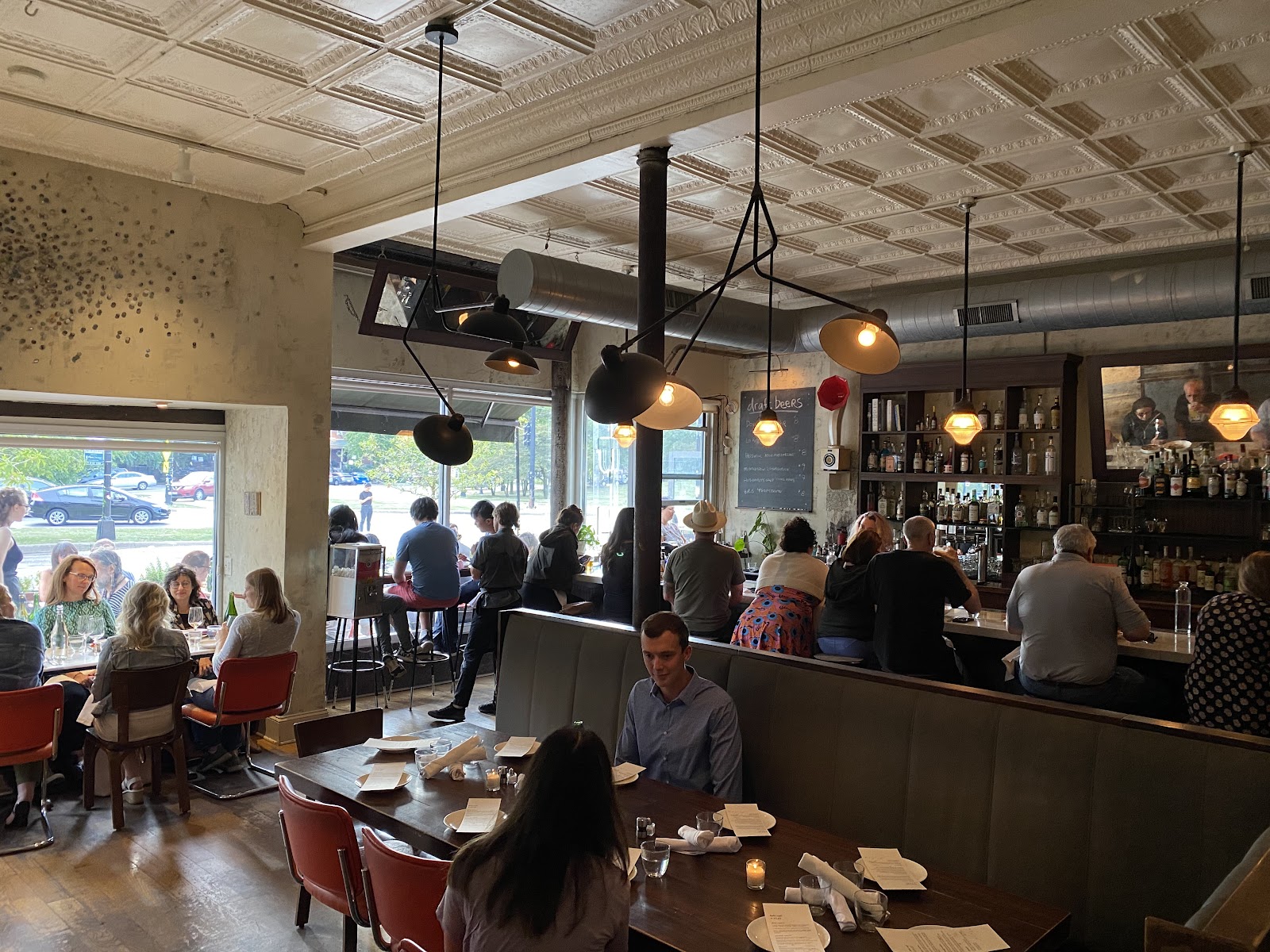 A Logan Square brunch table in Chicago with a breakfast burrito and coffee
