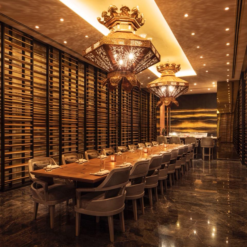 A glamorous Doha dining room set for a birthday dinner with a group