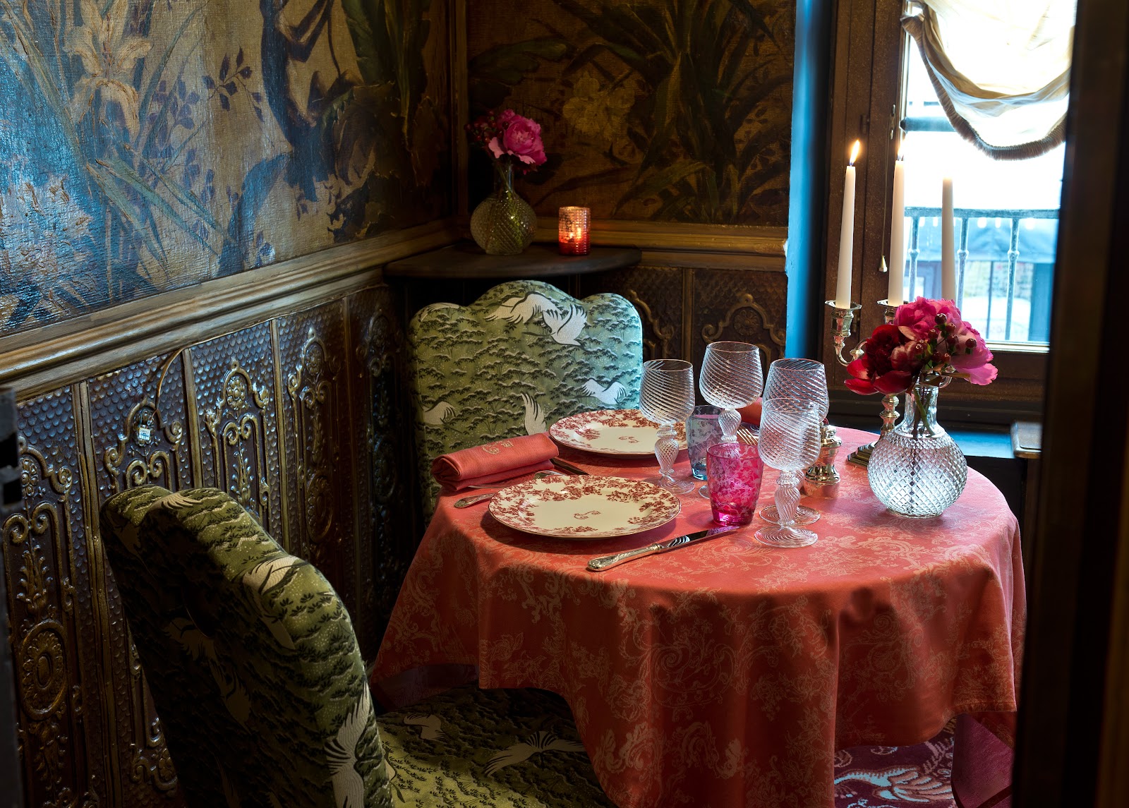 A historic private dining salon set for a group dinner in Paris