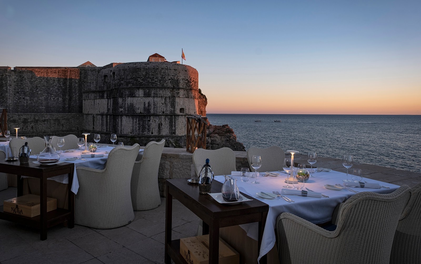 View over Dubrovnik's Old Town walls and the Adriatic at sunset