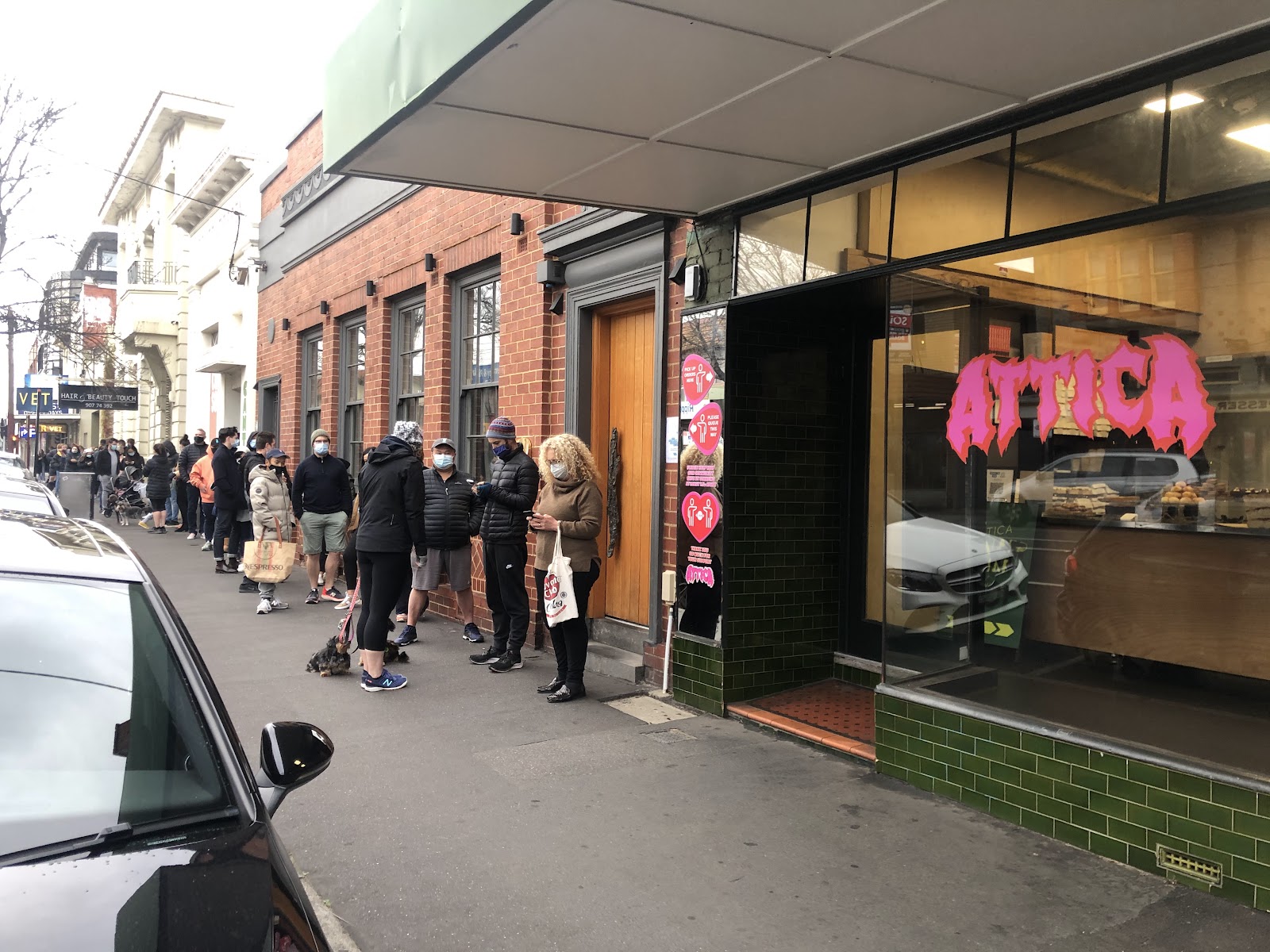 An elegant client dinner being served in a high-end Melbourne dining room