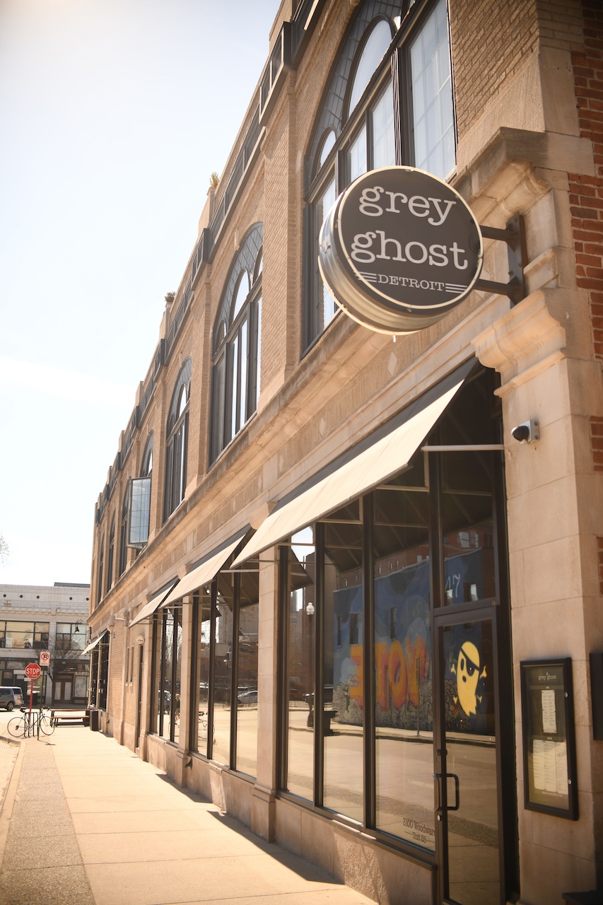 A dim, intimate first-date dinner table in Midtown Detroit