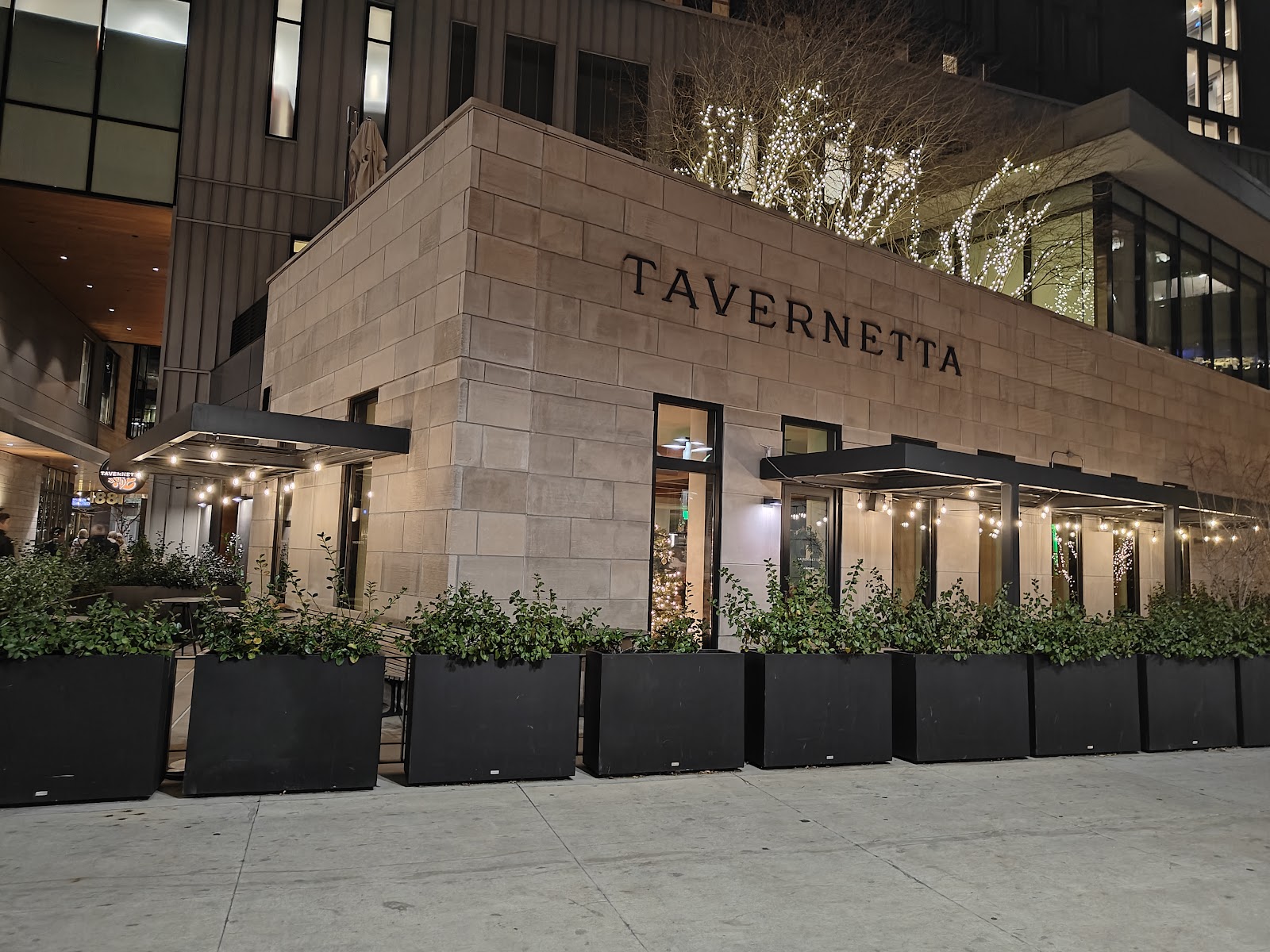 A lively birthday group dinner in a buzzy downtown Denver dining room