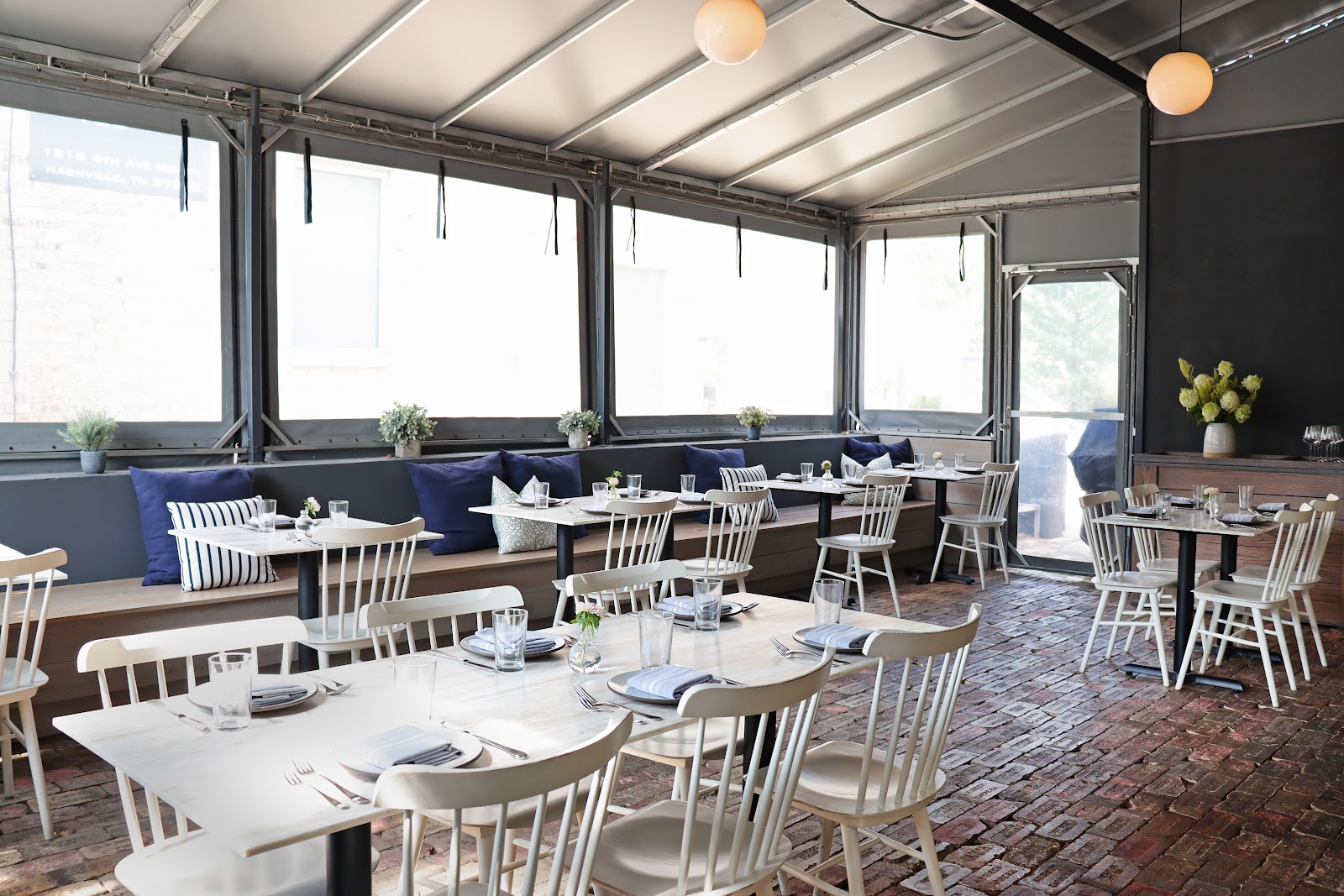 A Gulch brunch table in Nashville with a fried-chicken biscuit and coffee