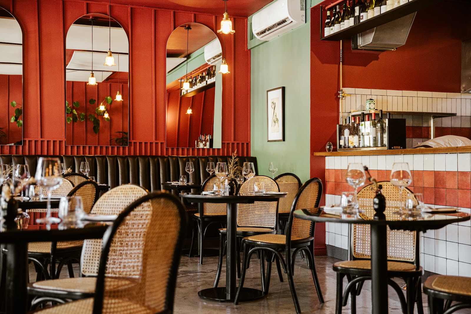 A candlelit corner table set for a first date in a Cape Town bistro