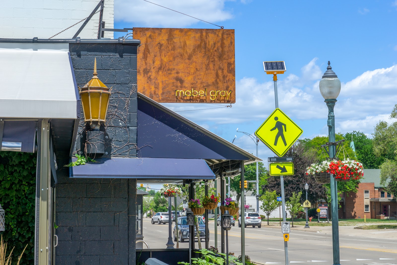 A single counter seat set for one diner at a Detroit restaurant in Midtown