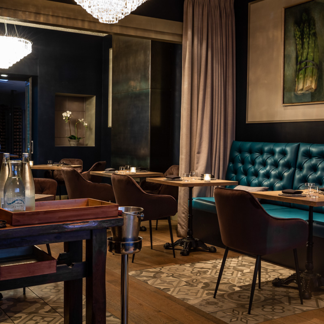 A candlelit table for two in an Auckland fine-dining room