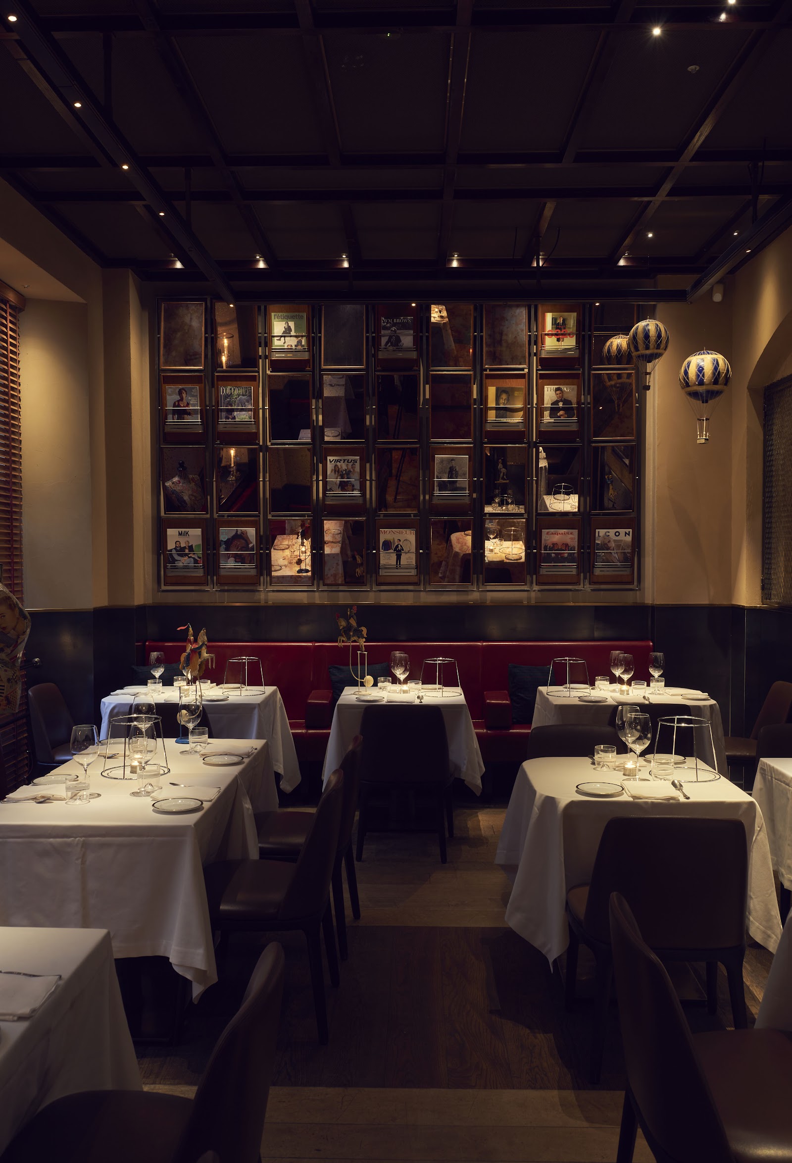 A private dining room set for a team dinner at a restaurant in central Milan