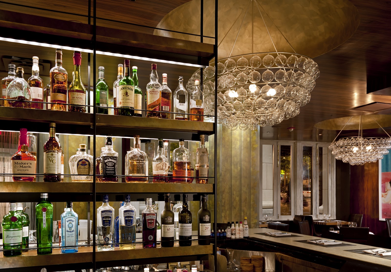 A glass-fronted wine cellar in a Washington DC dining room