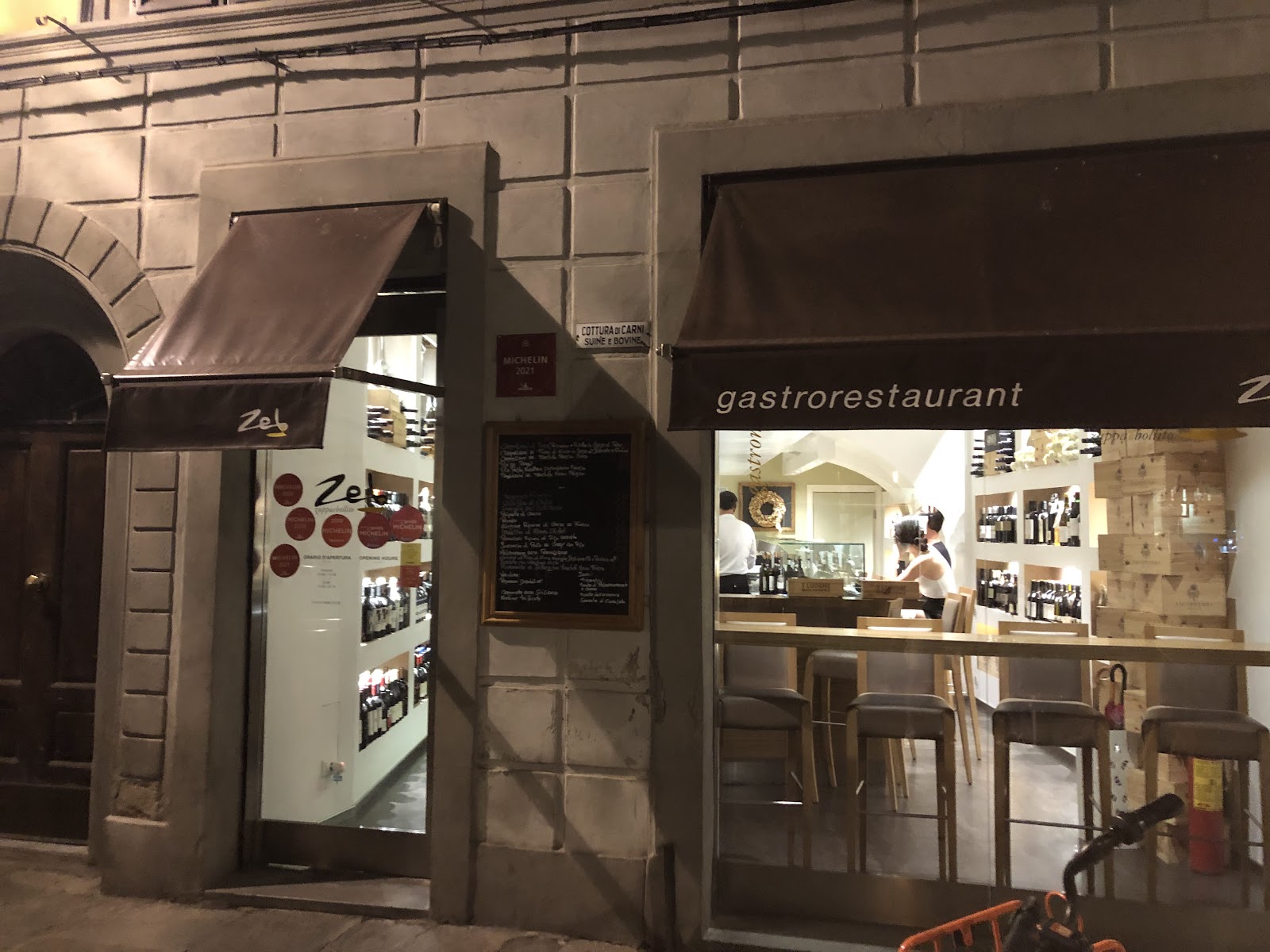 A counter seat at a Florentine pasta bar set for one diner
