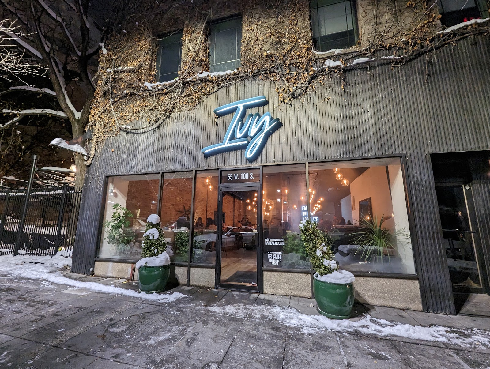 A downtown cocktail bar and open kitchen serving food late at night in Salt Lake City