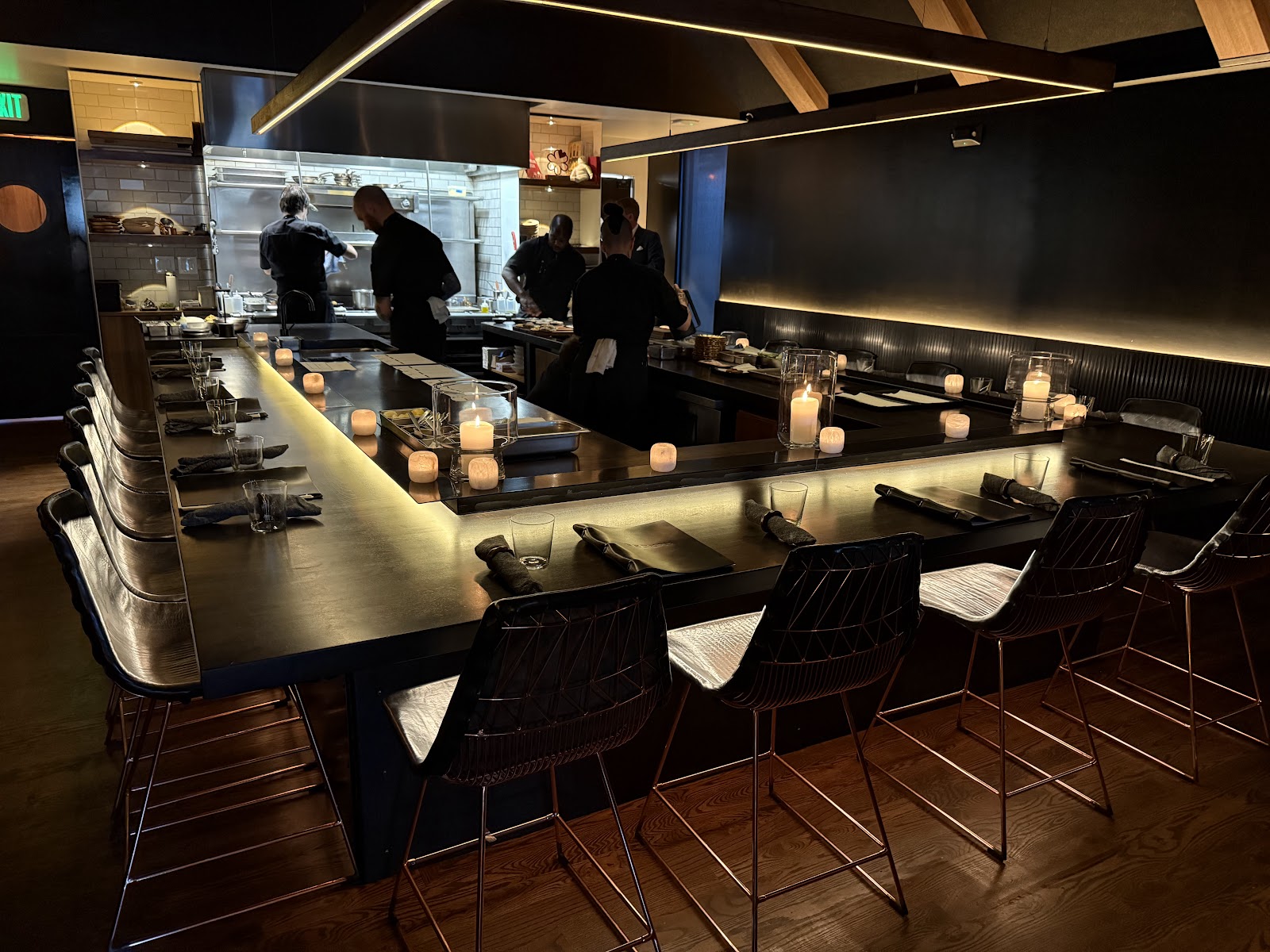 A candlelit anniversary table set in a Denver fine-dining room on Larimer Street