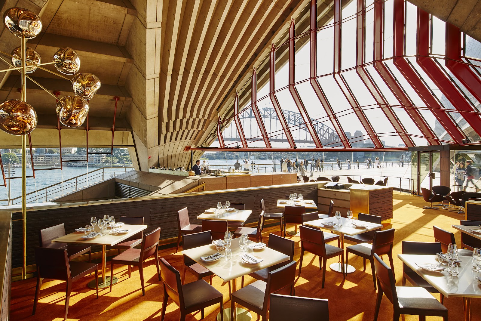 A harbour-view window table set for an anniversary dinner in Sydney