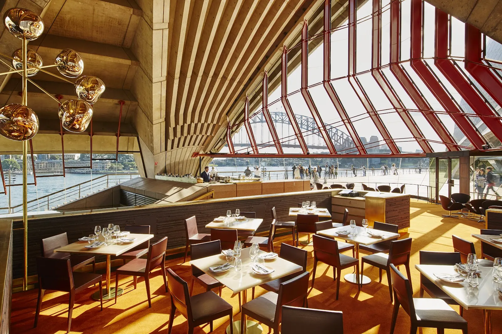A private dining room overlooking Sydney Harbour with the Opera House beyond