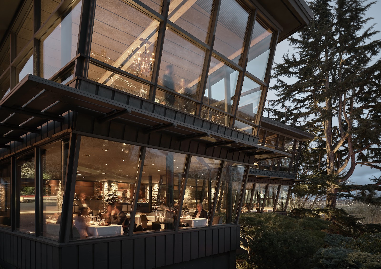 An Elliott Bay waterfront dining room at dusk in Seattle