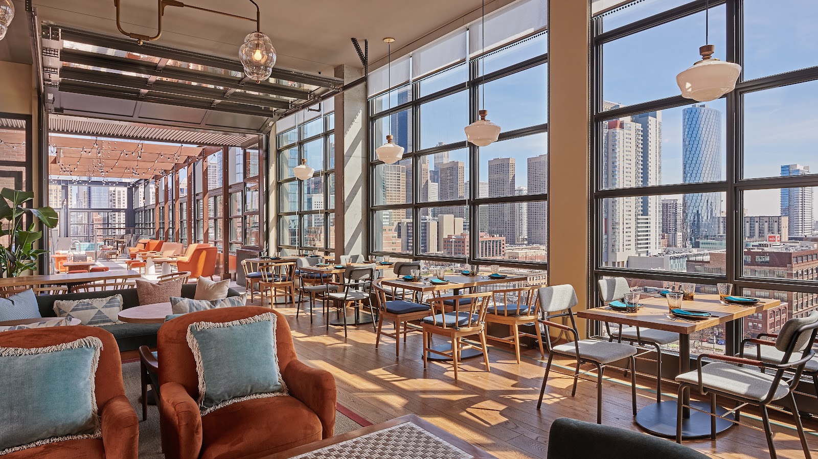 A rooftop terrace over the Fulton Market skyline at dusk in Chicago