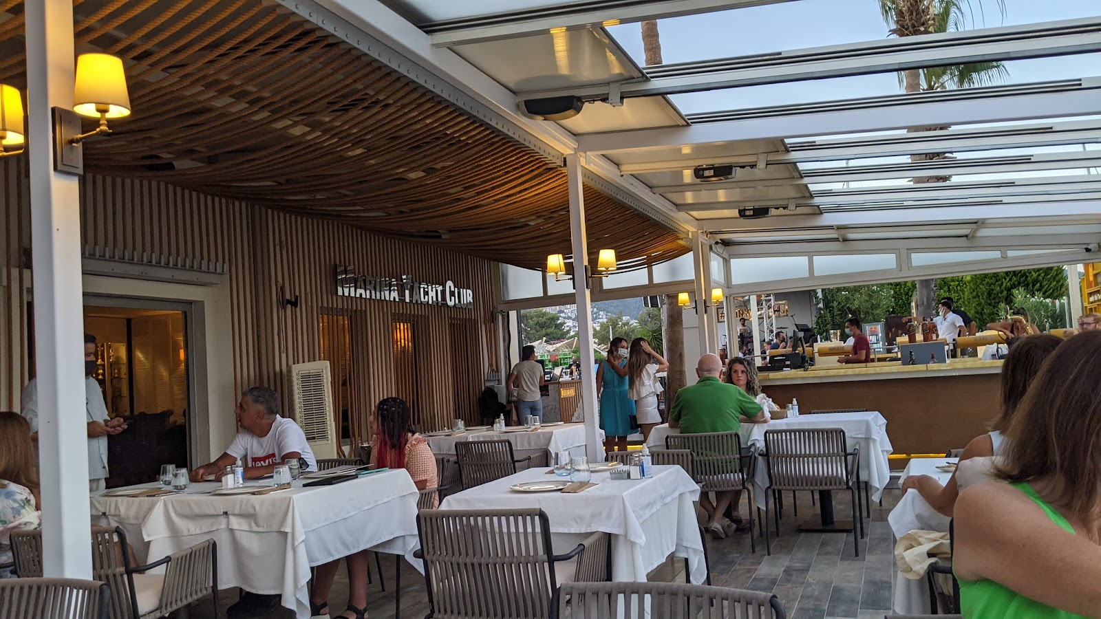 A waterfront Bodrum restaurant terrace serving meze and seafood late into a summer night