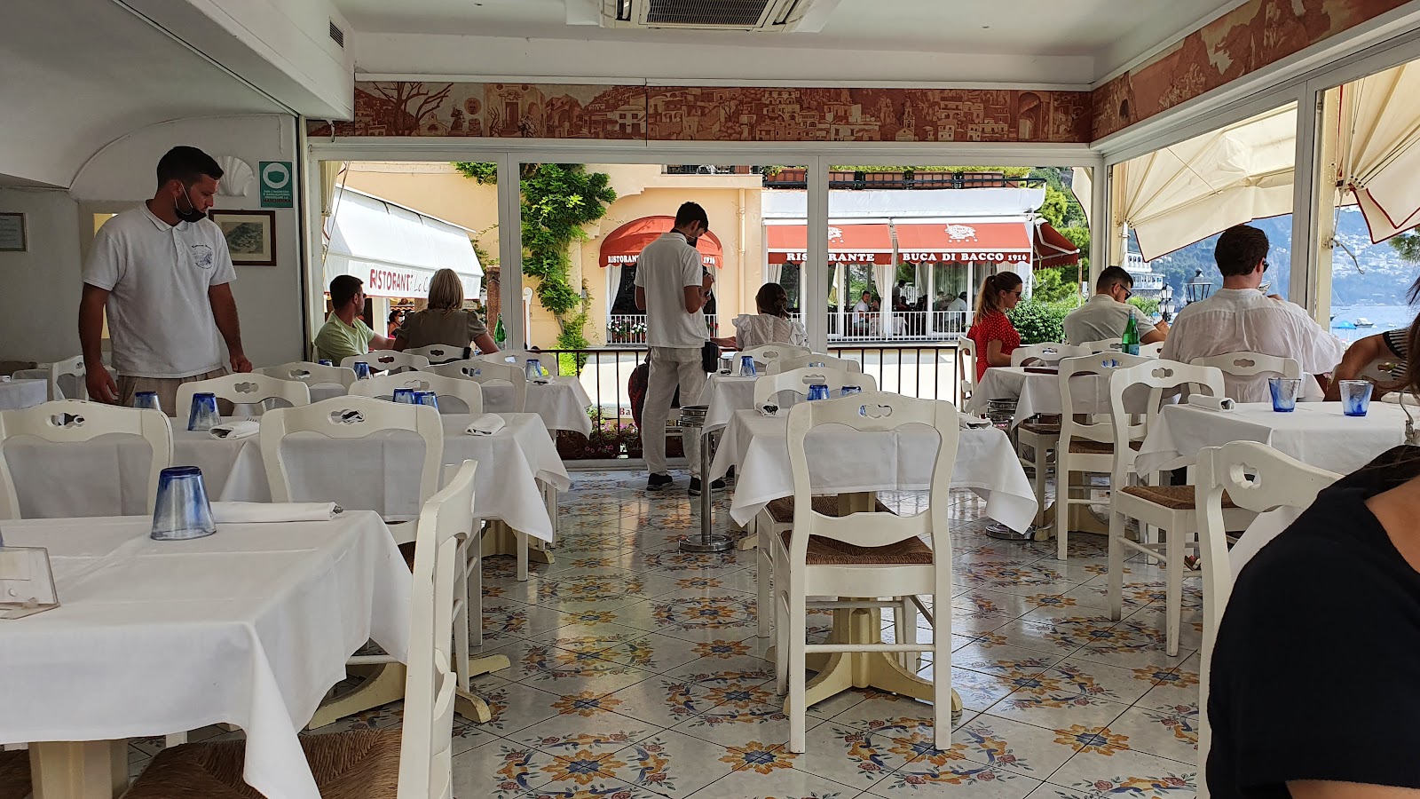 A single terrace table overlooking the sea in Positano at lunchtime