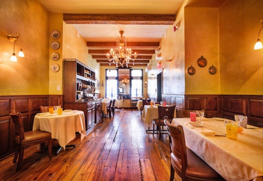 A well-spaced white-tablecloth table set for a client dinner in Center City Philadelphia