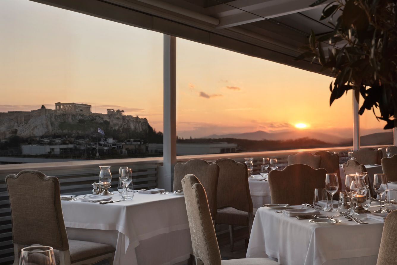 An Athens hotel dining terrace with an Acropolis view at the King George Hotel