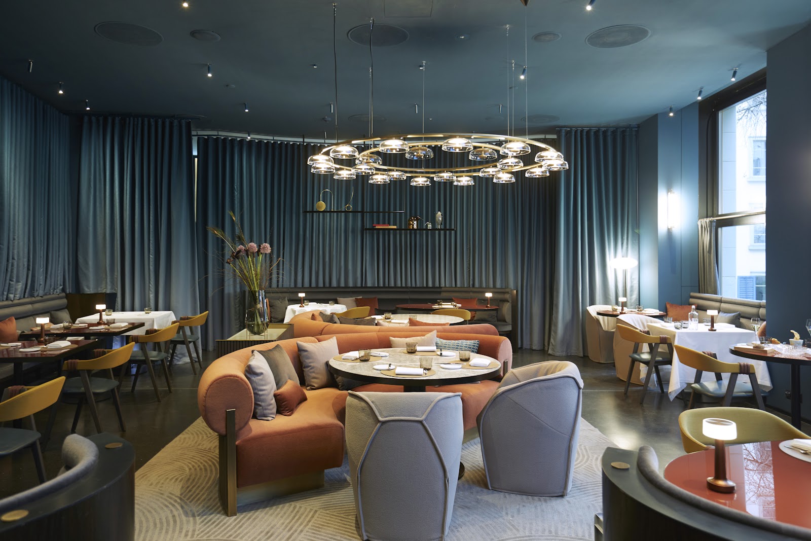 An intimate candlelit table for two in a Zurich old-town dining room