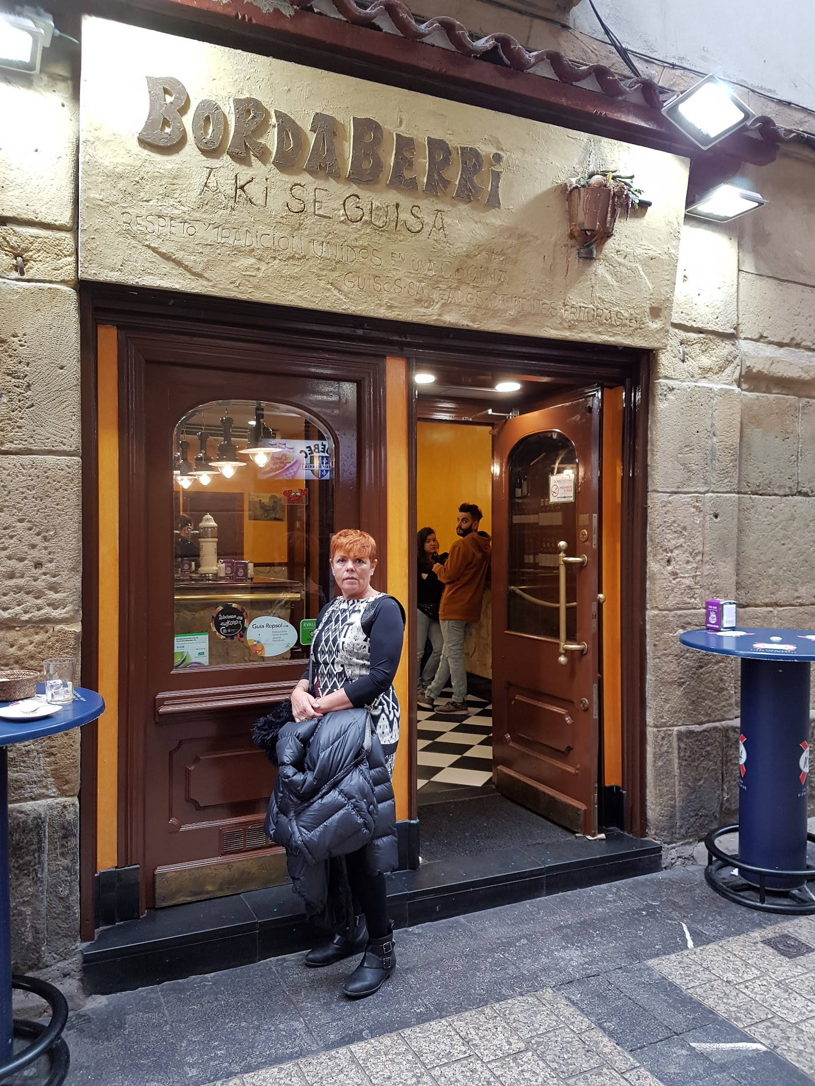 A pintxos counter crowded at the evening poteo in San Sebastián's Old Town