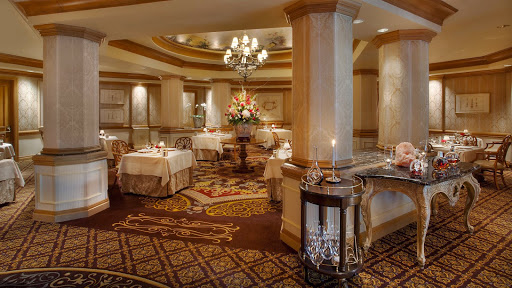 A glass-fronted wine cellar in an Orlando resort dining room