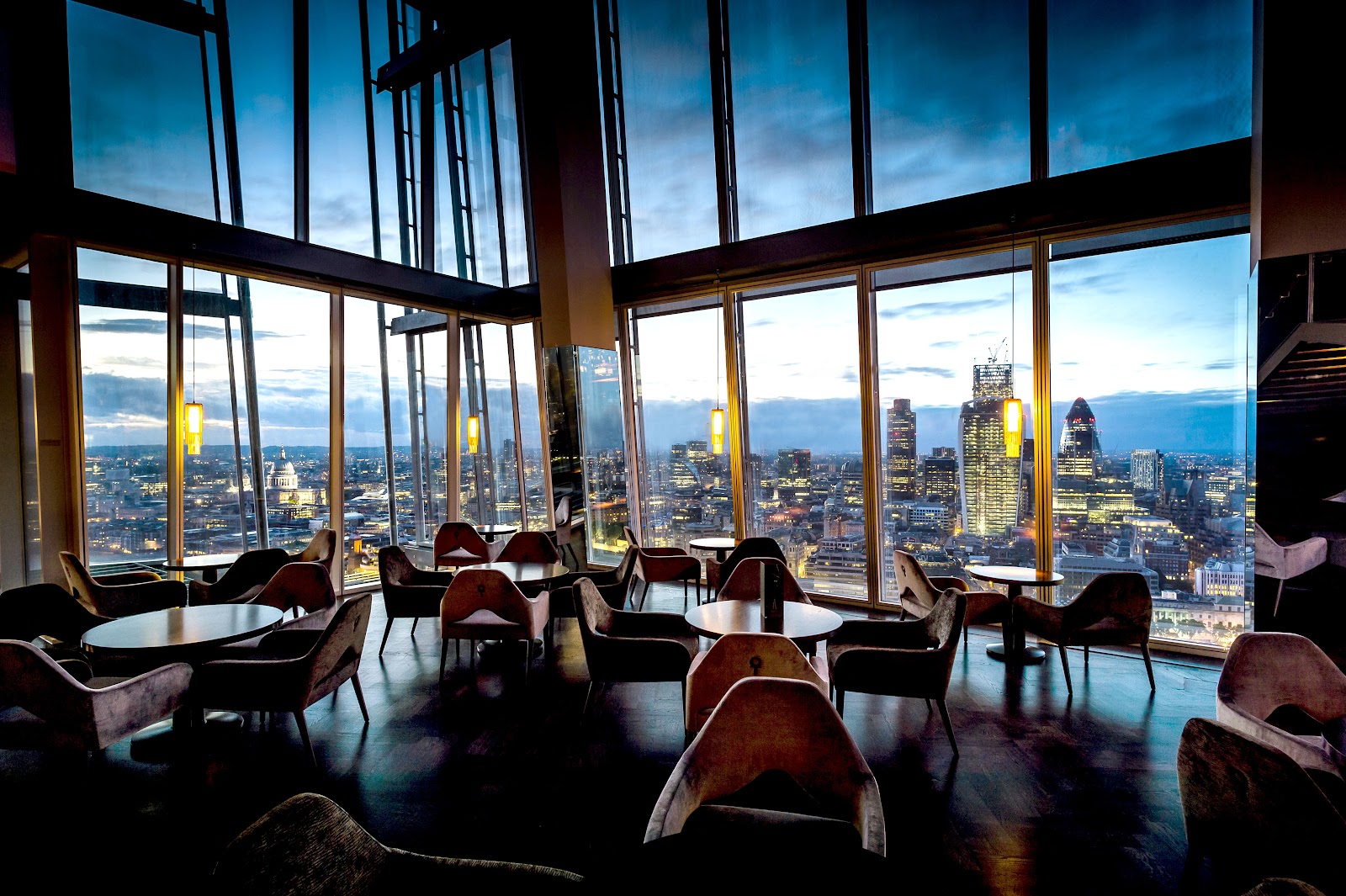 A riverside dining table looking across the Thames toward Tower Bridge in London