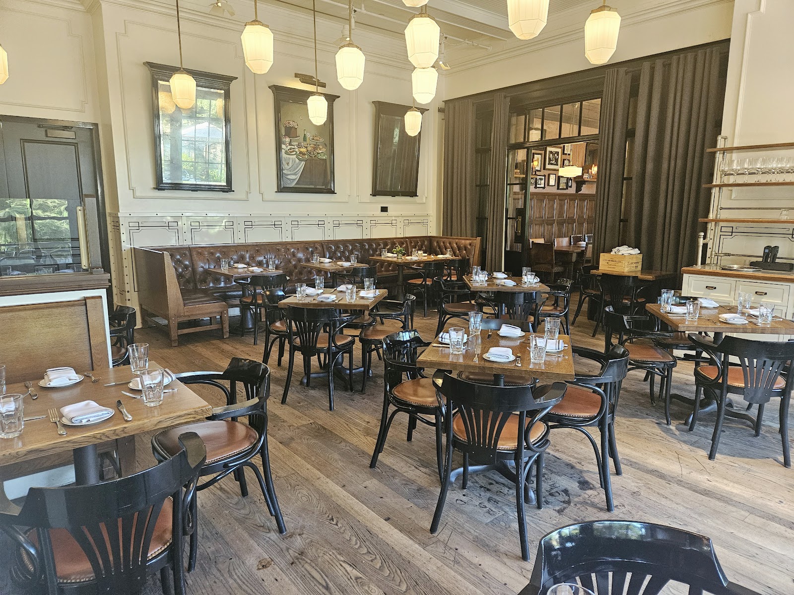 A candlelit two-top set for a first date in a San Antonio dining room