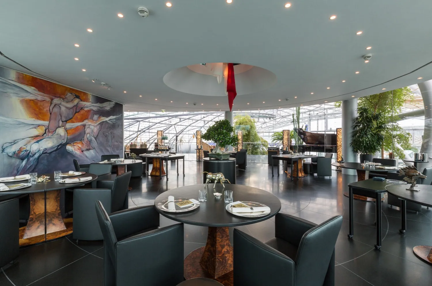 A two-Michelin-star dining room in Salzburg set for a client dinner