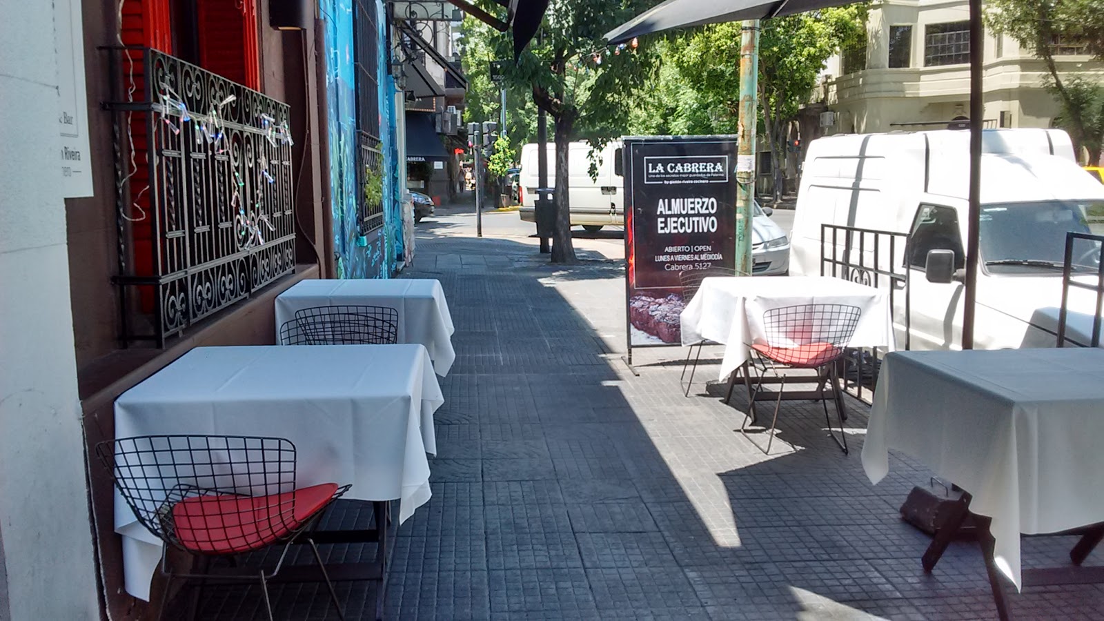 A bustling family parrilla dining room in Palermo, Buenos Aires