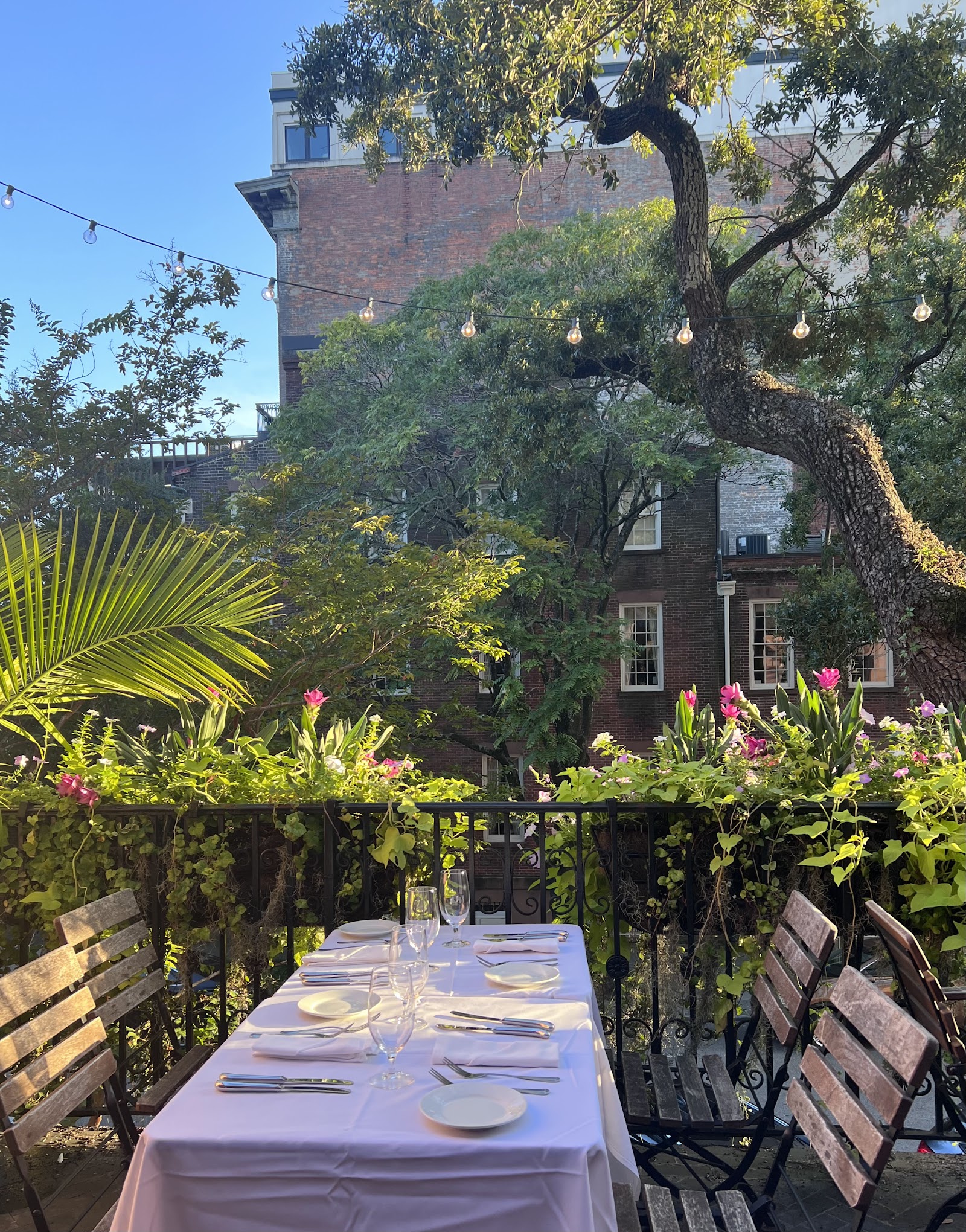 A historic-district bar and open kitchen serving food late at night in Savannah
