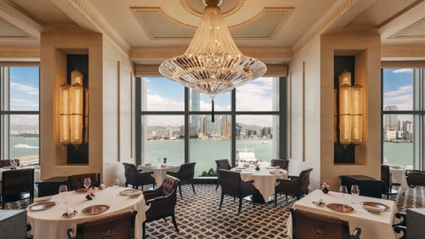 A refined restaurant dining room with harbour views in Central, Hong Kong